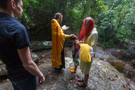 KOH CHANG, THAILAND - MAR 9, 2018: During Christian sacrament of spiritual birth - Baptism. There...
