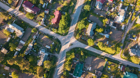 Top view of the village intersection of an urban-type settlement of Leningrad region, Russia.の写真素材
