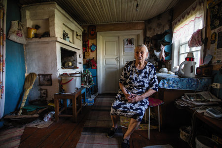 LADVA (VEPSIA) LENINGRAD.REG, RUSSIA - AUG 11, 2018: Vepsian local woman in her rural home. Veps language included in the 2009 UNESCO Atlas of the world's endangered languages as endangered.のeditorial素材