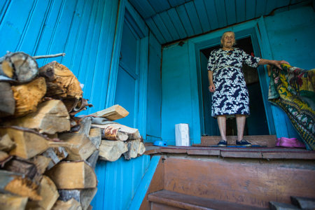 LADVA (VEPSIA) LENINGRAD.REG, RUSSIA - AUG 11, 2018: Vepsian local woman in them rural home. Veps language included in the 2009 UNESCO Atlas of the world's endangered languages as endangered.のeditorial素材