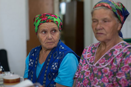 LADVA (VEPSIA) LENINGRAD.REG, RUSSIA - AUG 11, 2018: Vepsian locals women in the rural social club. Veps language included in the 2009 UNESCO Atlas of the world's endangered languages as endangered.のeditorial素材