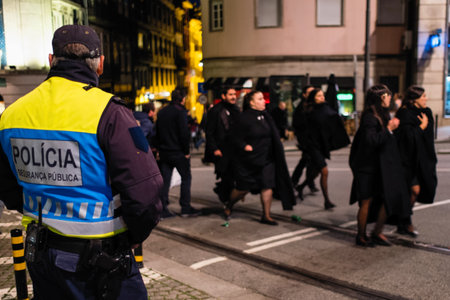 PORTO, PORTUGAL - OCT 28, 2018: Participants of the traditional Cortejo da Latada universities student festival in Porto center. Week of Reception to the Freshman takes place last days of October.のeditorial素材
