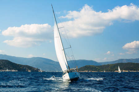 Sailing yachts regatta in Aegean sea. Luxury vacation.