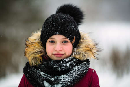 Winter portrait of a little girl outdoor.