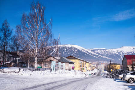 On of one of the streets of the Sheregesh urban-type settlement in Mountain Shoria, Siberia -...