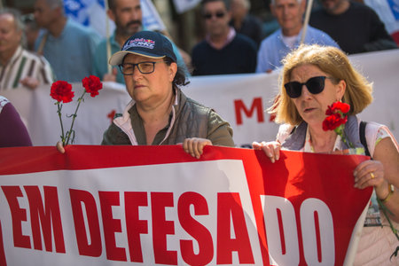 PORTO, PORTUGAL - MAY 1, 2019: Celebration of May Day in the Oporto centre. General Confederation of Portuguese workers, traditionally associated with the Communist party, has 800.000 members.のeditorial素材