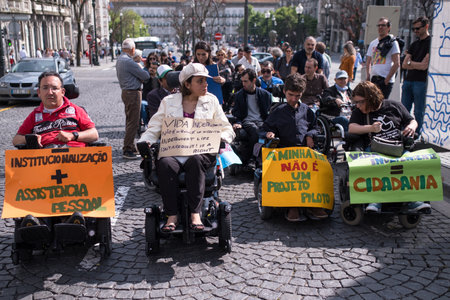 PORTO, PORTUGAL - MAY 5, 2019: Manifesto Marcha pela Vida Independente (the march of disabled people) Demanding compliance with rights in terms of personal assistance, housing, employment, educationのeditorial素材