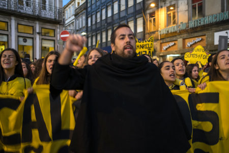 PORTO, PORTUGAL - OCT 28, 2018: Participants of the traditional Cortejo da Latada universities student festival in Porto center. Week of Reception to the Freshman takes place last days of October.のeditorial素材