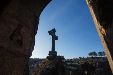 The Ð¡ross in an abandoned chapel on Douro banks in Porto, Portugal.の写真素材
