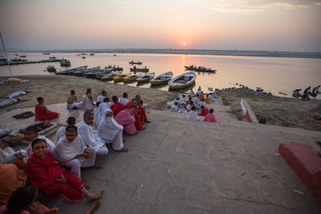 VARANASI, INDIA - MAR 20, 2018: Banks on the holy Ganges river in the early morning. According to legends, the city was founded by God Shiva about 5000 years ago.のeditorial素材