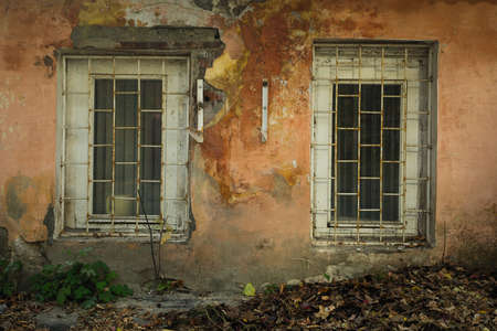 Windows ground floor of an old stone house. Voronezh, Russia.の写真素材