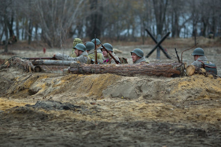 VORONEZH, RUSSIA - NOV 10, 2019: Participants of military-historical reconstruction, dedicated to combat action in 1941 during WWII. More than 200 reenactors are involved in reconstruction of battle.のeditorial素材