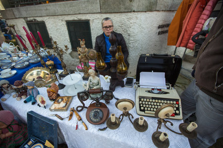 PORTO, PORTUGAL - DEC 7, 2019: The saturday flea market in the old city. Porto is often referred to as Capital of the North, city won the European Best Destination 2012, 2014 and 2017 awards.のeditorial素材
