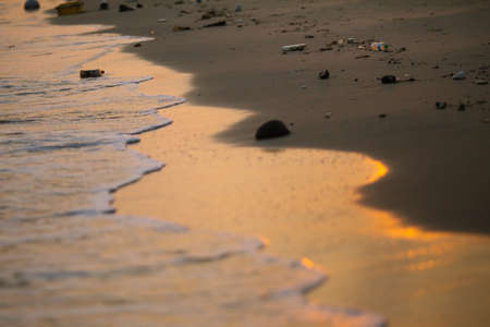 Polluted tropical beach. Pollution and environmental problems.