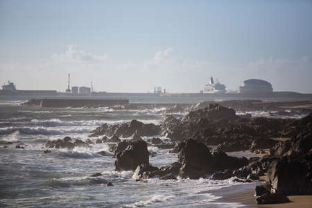 View of the surf rocky ocean shore near the Port.