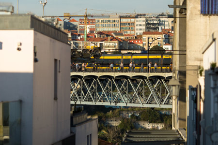 PORTO, PORTUGAL - FEB 22, 2020: Dom Luis I bridge in old downtown. Porto is often referred to as...