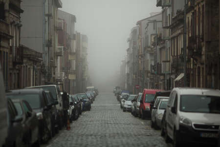 View of the street in cloudy weather of the old center of Porto, Portugal.