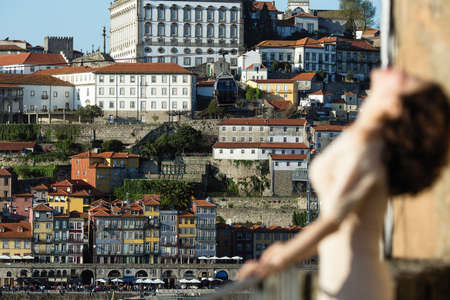 Blurred woman on a street in old Porto downtown. Portugal. の写真素材