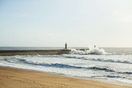 Surf and waves on the ocean embankment. Porto, Portugal.の写真素材