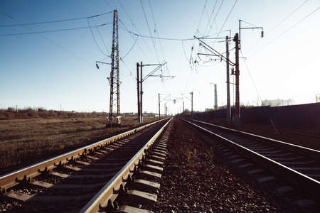 Railway tracks and electric lines in the industrial zone.