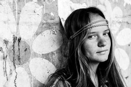 Portrait of young girl hippie. Black and white photo.の写真素材