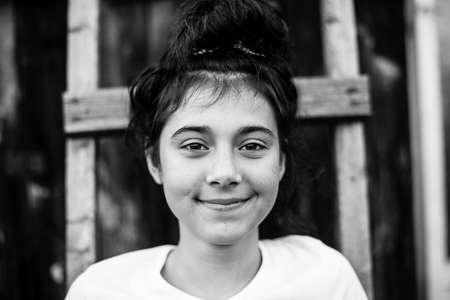 Portrait of teen girl outdoor. Black and white photography.の写真素材