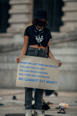 PORTO, PORTUGAL - SEP 25, 2020: During the Global Strike for Climate. Participants arranged an installation of old shoes on the steps in front of Porto City Hall.のeditorial素材