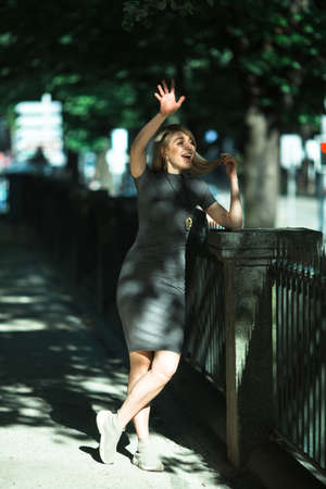 A young slim woman in the green Park at summer.の写真素材