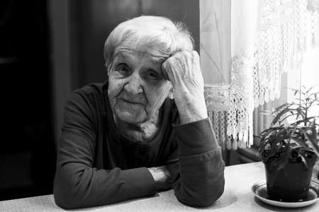 Portrait of elderly russian woman. Black and white photo.の写真素材