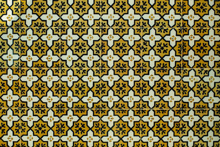 Traditional old tiles on street painted tin-glazed, azulejos ceramic tilework. Porto, Portugal.の写真素材