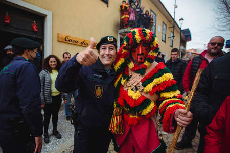 PODENCE, PORTUGAL - MAR 1, 2022: During the ancient Carnival held in the village of Podence. Is one of the most important traditional events of northern Portugal, UNESCO Intangible World Heritage.のeditorial素材