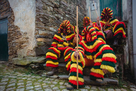 PODENCE, PORTUGAL - MAR 1, 2022: During the ancient Carnival held in the village of Podence. Is one of the most important traditional events of northern Portugal, UNESCO Intangible World Heritage.のeditorial素材