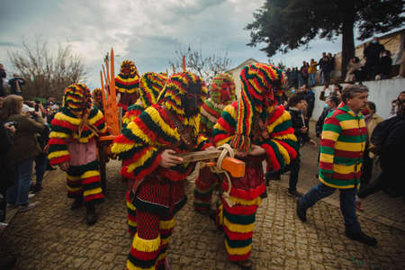 PODENCE, PORTUGAL - MAR 1, 2022: During the ancient Carnival held in the village of Podence. Is one of the most important traditional events of northern Portugal, UNESCO Intangible World Heritage.のeditorial素材