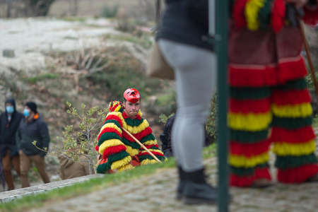 PODENCE, PORTUGAL - MAR 1, 2022: During the ancient Carnival held in the village of Podence. Is one of the most important traditional events of northern Portugal, UNESCO Intangible World Heritage.のeditorial素材