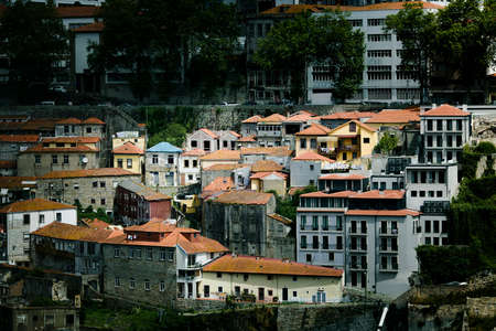 View of residential houses on the banks of the Douro River in Porto, Portugal.の写真素材