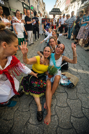 PORTO, PORTUGAL - YUL 2, 2022: During traditional Rusgas at the end of the St. John's festivities. Rusgas de Sao Joao is a tradition involving the various parishes of the city that dates back to 1957.のeditorial素材
