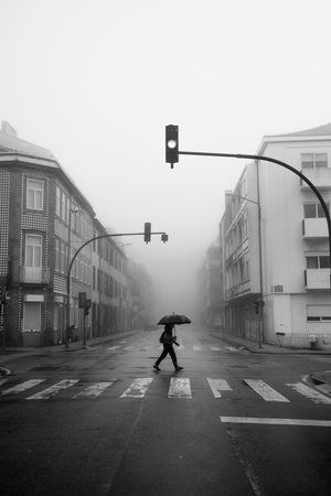 View of the foggy street in Porto, Portugal. black and white photo.の写真素材