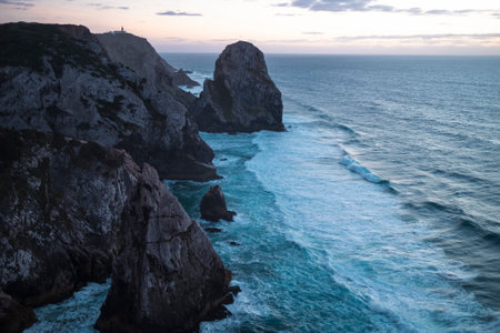 View of the cliffs and the ocean surf on the Portuguese Atlantic coast. Cabo da Roca, Portugal.の写真素材