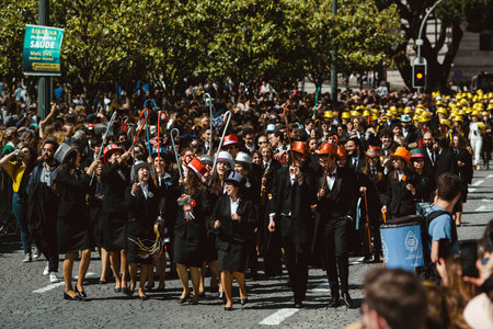 PORTO, PORTUGAL - MAY 9, 2023: Porto's Queima das Fitas Parade - annual festivity of Portuguese...