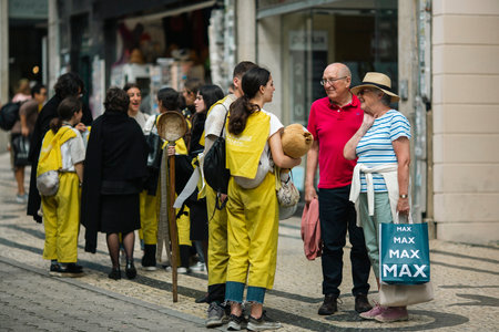 PORTO, PORTUGAL - MAY 8, 2023: Charity Day as part of Queima das Fitas - annual festivity of...