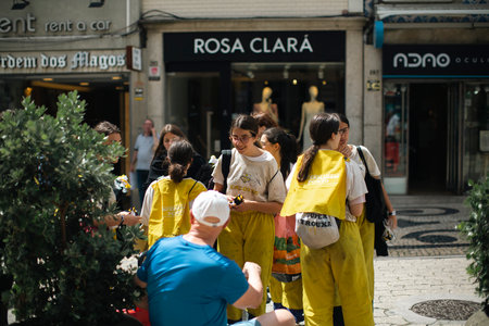 PORTO, PORTUGAL - MAY 8, 2023: Charity Day as part of Queima das Fitas - annual festivity of Portuguese students of universities. During this day students to collect donations for charitable causes.のeditorial素材