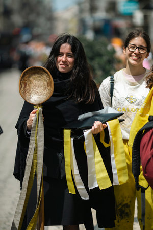 PORTO, PORTUGAL - MAY 8, 2023: Charity Day as part of Queima das Fitas - annual festivity of Portuguese students of universities. During this day students to collect donations for charitable causes.のeditorial素材