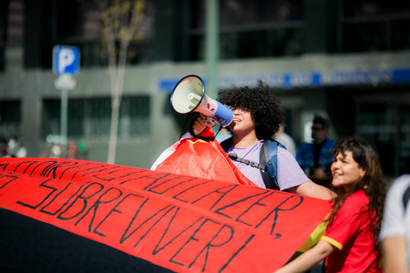 PORTO, PORTUGAL - MAY 1, 2023: During celebration of May Day in the Porto historical centre. In Portugal, it was after the Carnation Revolution 1974, that the May Day was again freely commemorated.のeditorial素材