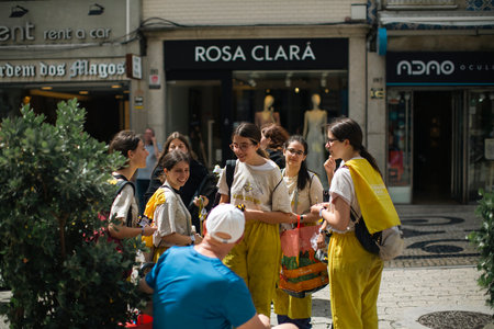 PORTO, PORTUGAL - MAY 8, 2023: Charity Day as part of Queima das Fitas - annual festivity of Portuguese students of universities. During this day students to collect donations for charitable causes.のeditorial素材