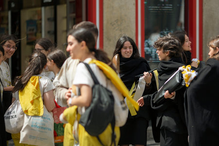 PORTO, PORTUGAL - MAY 8, 2023: Charity Day as part of Queima das Fitas - annual festivity of Portuguese students of universities. During this day students to collect donations for charitable causes.のeditorial素材