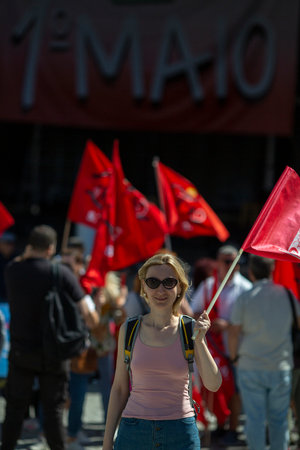 PORTO, PORTUGAL - MAY 1, 2023: During celebration of May Day in the Porto historical centre. In Portugal, it was after the Carnation Revolution 1974, that the May Day was again freely commemorated.のeditorial素材