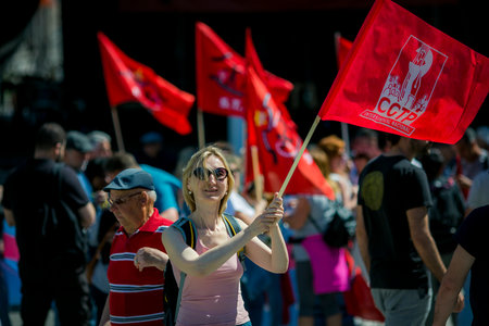 PORTO, PORTUGAL - MAY 1, 2023: During celebration of May Day in the Porto historical centre. In Portugal, it was after the Carnation Revolution 1974, that the May Day was again freely commemorated.のeditorial素材