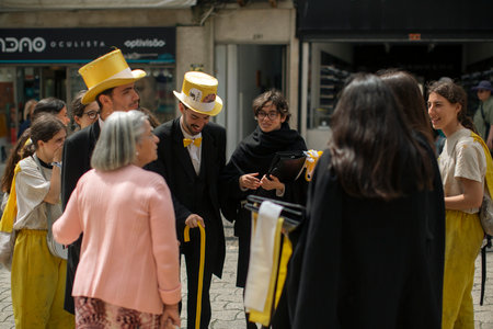 PORTO, PORTUGAL - MAY 8, 2023: Charity Day as part of Queima das Fitas - annual festivity of Portuguese students of universities. During this day students to collect donations for charitable causes.のeditorial素材