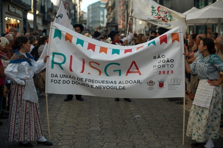 PORTO, PORTUGAL - YUL 1, 2023: Closing the week of Saint John festival, the popular marches aka Rusgas take to streets in the city. Festivities have been held in the Porto for more than six centuries.のeditorial素材