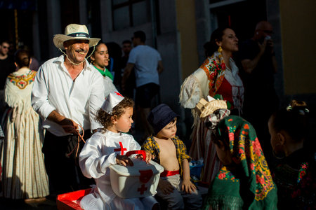 PORTO, PORTUGAL - JUL 1, 2023: Closing the week of Saint John festival, the popular marches aka Rusgas take to streets in the city. Festivities have been held in the Porto for more than six centuries.のeditorial素材